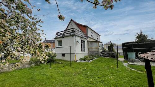Hinterseite - Einfamilienhaus mit 125,00 m² in Großröhrsdorf zum Kaufen