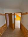 Flur mit Blick zu den Schlafzimmern - 