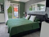 Schlafzimmer mit Balkon - 