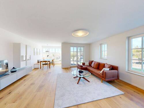 lichtdurchfluteter Wohn-Essbereich mit Kamin - 