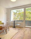 Wohnzimmer mit Balkon - 