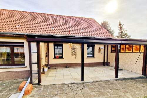 Hof mit Terrasse - Einfamilienhaus mit 99,40 m² in Küstriner Vorland zum Kaufen