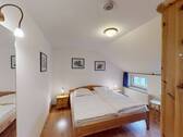 Schlafzimmer 2 im Dachgeschoss - 