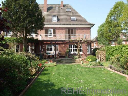 Gartenseitiger Blick auf das Haus - 1-Familienhaus im Landhausstil mit voll ausgebautem Dachgeschoss in 47665 Sonsbeck