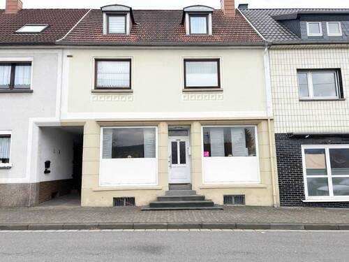 Außenansicht - Alle Möglichkeiten stehen offen! Einfamilienhaus mit Gewerbeeinheit, großer Terrasse und Werkstatt!