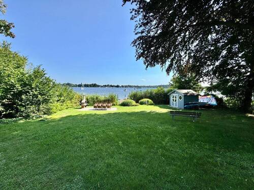 Gemeinschaftsgarten mit Bootsliegeplatz - 