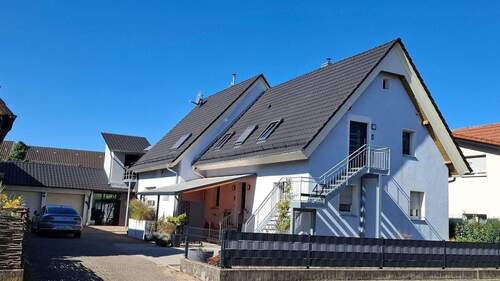 20250918_115109.jpg - Modernisiertes Zweifamilienhaus mit Garten und Pool.