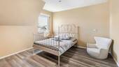1. OG Schlafzimmer 1 - 