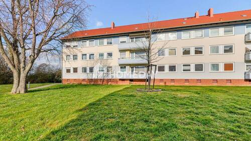 Außenansicht 3 - Charmante 1-Zimmer-Wohnung im Erdgeschoss mit Keller und Stellplatz - Erbpacht vorhanden