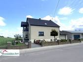 seitl. Straßenansicht - 6 Zimmer Einfamilienhaus in Mettlach / Faha