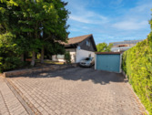 Garage und Parkfläche - 