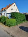 Giebelansicht mit Anbau - 8 Zimmer Einfamilienhaus zum Kaufen in Lünen