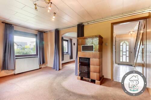Derzeit zweiter Holzofen im weiteren Zimmer - 