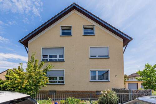 Vorderansicht - Mehrfamilienhaus, Wohnhaus mit 290,30 m² in Rüsselsheim zum Kaufen