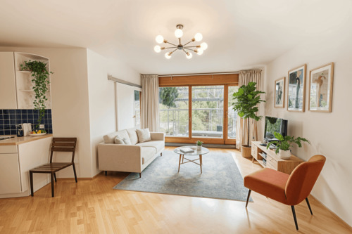 Wohnzimmer - Staging - Architektonisches Highlight mit Südterrasse und Ausblick zum Preußenpark: Stilvolle 2-Zimmer-Wohnung