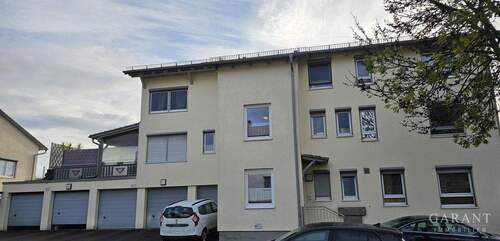 Aussenansicht - Schöne, helle 3 Zimmer-Wohnung mit Terrasse und Garten