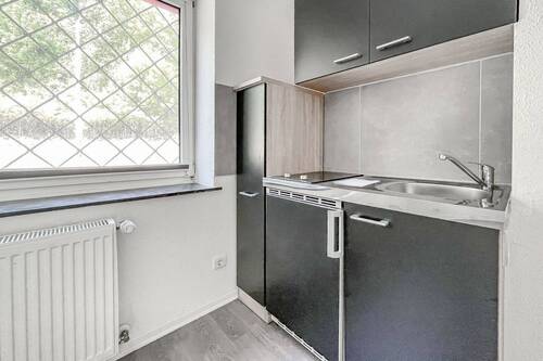 Küchenbereich mit Einbauküche - 