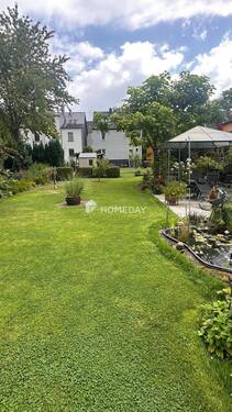 Garten - Charmantes Mehrfamilienhaus mit Gartenidylle - frei werdend und in sehr gutem Zustand