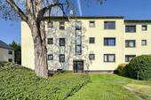 Hausansicht - Bezugsfrei! Helle 2-Zimmer-Eigentumswohnung mit Balkon in Köln-Sürth