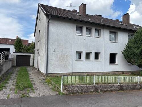Ansicht - 7 Zimmer Mehrfamilienhaus, Wohnhaus zum Kaufen in Sulzbach/Saar / Hühnerfeld