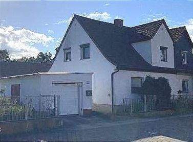 Außensansicht - DHH in Wansleben am See - 120.000,00 EUR Kaufpreis, ca.  120,00 m² Wohnfläche