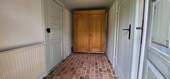im Flur mit Backsteinboden - 