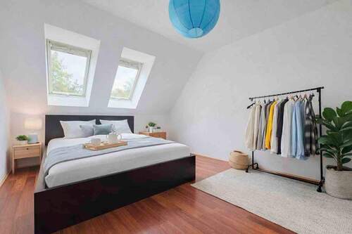 Schlafzimmer I OG (digital gestaged) - 