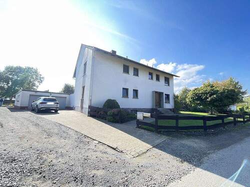 Hausansicht von Straße - Mehrfamilienhaus, Wohnhaus mit 200,00 m² in Minden zum Kaufen