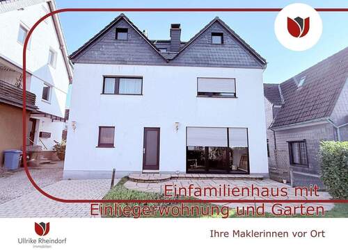 Das sanierte Haus - gartenseitig - Charmantes EFH mit Einliegerwohnung, Garten & 2 PKW-Stellplätzen – teilsaniert
