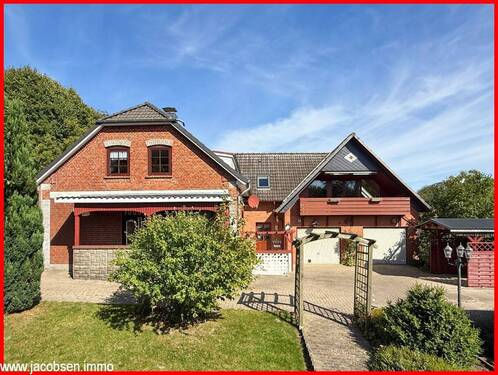 Westansicht - Im Herzen von Angeln - charmantes Einfamilienhaus mit Einliegerwohnung und Blick über die Felder