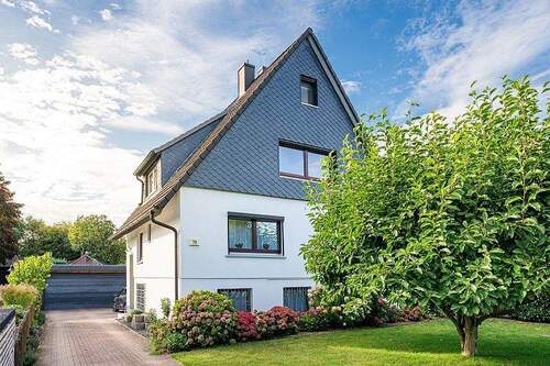 Objektansicht - Gepflegtes Einfamilienhaus mit traumhaftem Garten in familienfreundlicher Lage