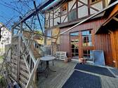 Terrasse vor Gebäude 2 - Einfamilienhaus mit 356,00 m&sup2; in Edermünde zum Kaufen