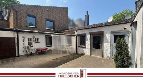 Immobilien Thielscher - Vielseitiges Einfamilienhaus mit großem Garten, Garage - Ideal für Mehrgenerationen oder Handwerker