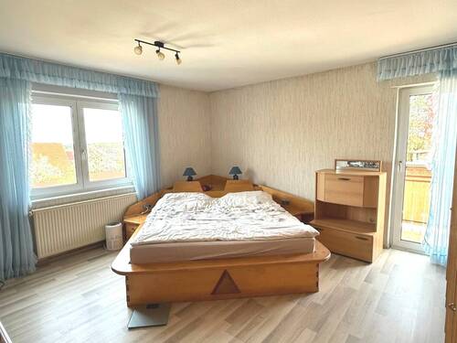 Zimmer mit Balkonzugang im DG - 