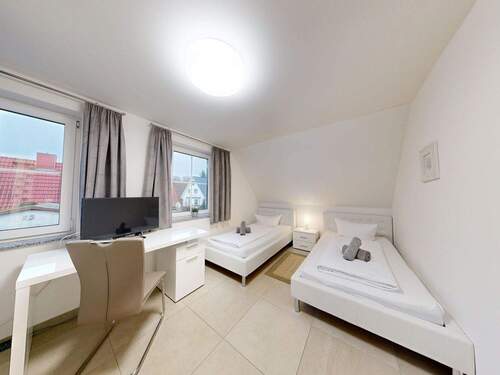 Schlafzimmer 3 mit Arbeitsplatz im OG - 