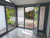 Wintergarten mit Zugang zur Terrasse - 