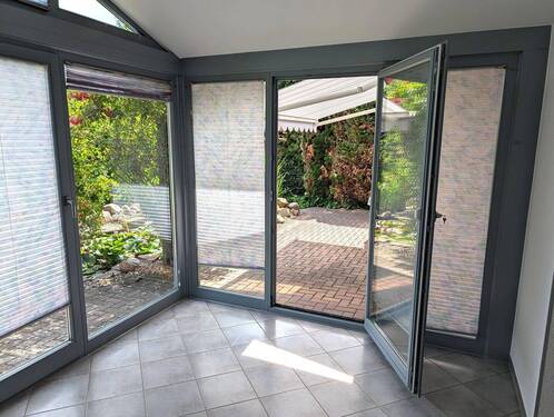 Wintergarten mit Zugang zur Terrasse - 