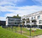 Ansicht Gartenseite klein - Wohlfühlwonhen in Aachen Brand, großzügige 4 Zimmer-Wohnung, Einbauküche, Fußbodenheizung, barierefreier Zugang