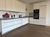 Ausschnitt Einbauküche - 4 Zimmer Etagenwohnung zum Kaufen in Aachen