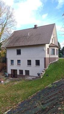 Seitenansicht - Mehrfamilienhaus, Wohnhaus mit 150,00 m&sup2; in Varel zum Kaufen