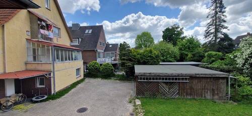 hintere Ansicht - Mehrfamilienhaus, Wohnhaus mit 119,00 m&sup2; in Bad Oldesloe zum Kaufen