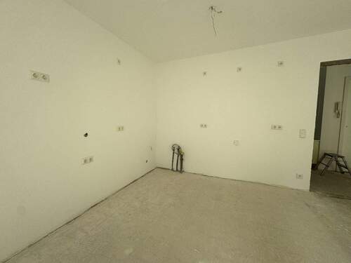 Wohnzimmer mit offener Küche Bild 3 - 