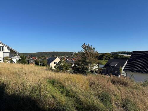 Blick auf Neubaugebiet - Baugrundstück DHH 
