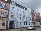 Wohngebäude - Charmantes 3-Zimmer-Apartment in Neumünster Innenstadt mit Balkon