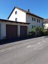 Vorder-u. Seitenansicht / Garagen - 2 - 3 Familienhaus in Oberasbach Kreutles