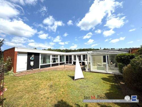 rückwärtige Ansicht - Familien-Bungalow mit 145 m² Wohn-Nutzfläche und 4,5 Zimmer in ruhiger Lage von Groß Grönau