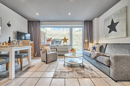Wohnzimmer App. EG links - 1 Zimmer Mehrfamilienhaus, Wohnhaus in Hörnum (Sylt)