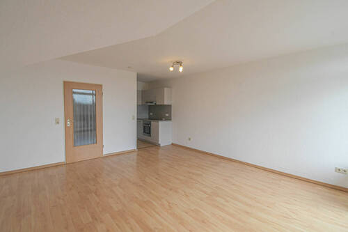 Wohnzimmer - Etagenwohnung mit 53,90 m&sup2; in Edewecht zum Kaufen