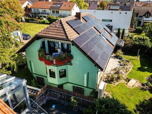 Seitenansicht - 8 Zimmer Mehrfamilienhaus, Wohnhaus zum Kaufen in Fußgönheim