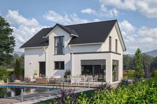 Bild 1 - Ein Raumwunder mit Platzreserve. Bezugsfertiges QNG-Haus!